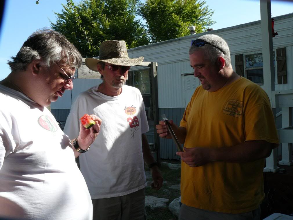 While Tex inspects his watermelon photo OgresCookOut2008068.jpg
