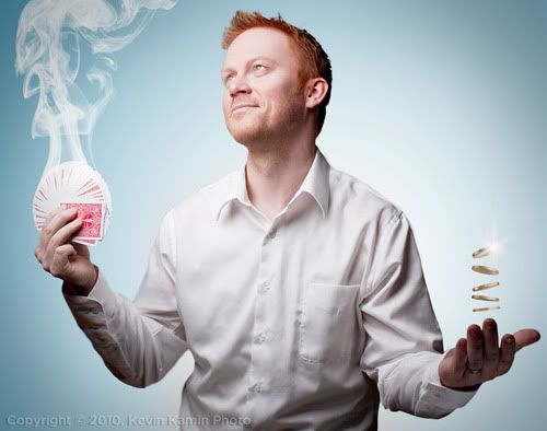 IMAGE: http://i267.photobucket.com/albums/ii281/kevinkamin77/magician_smoking_cards.jpg