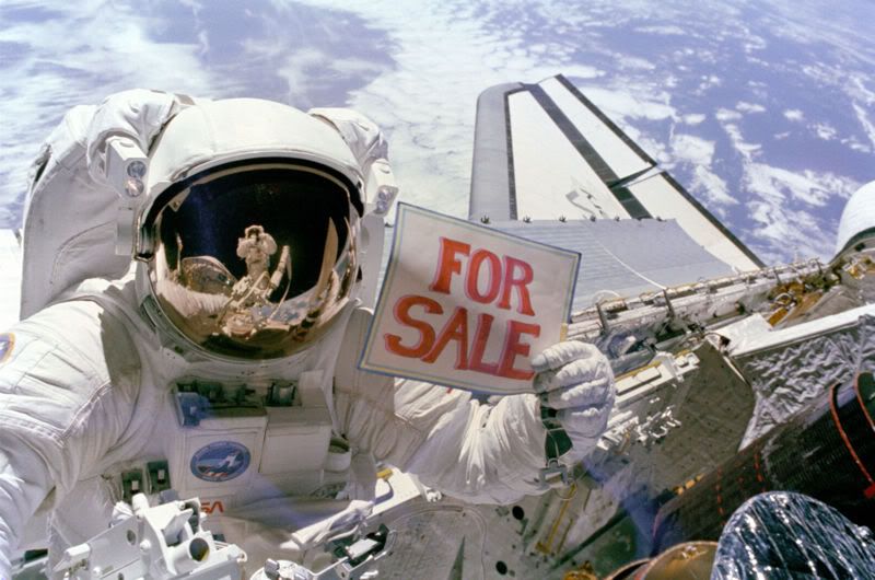 800px-NASA_astronaut_with_for_sale_.jpg